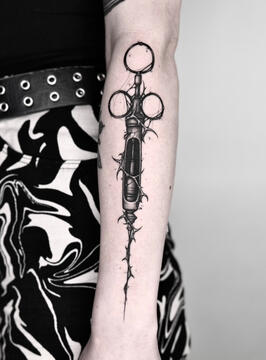 Custom old syringe tattoo